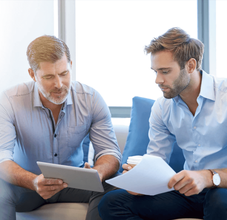 mentoring-coaching-two-men-at-office